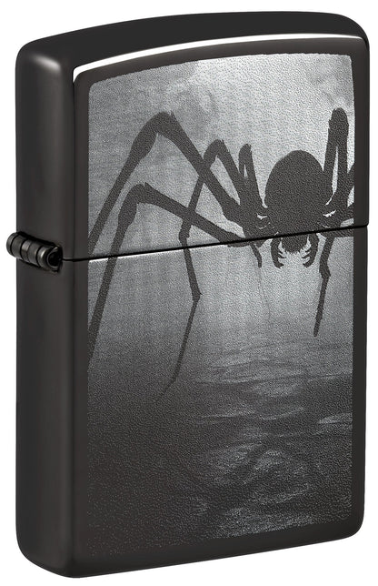 Black Zippo lighter with spider design on a dark background P1