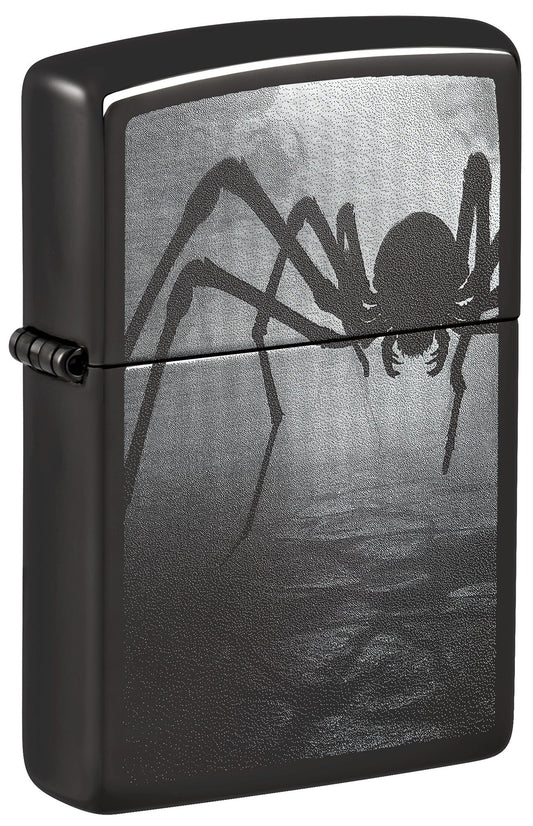 Black Zippo lighter with spider design on a dark background P1